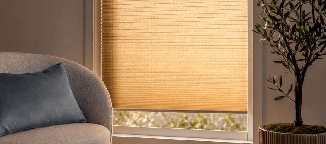 Close-up cellular shade honeycomb fabric by window
