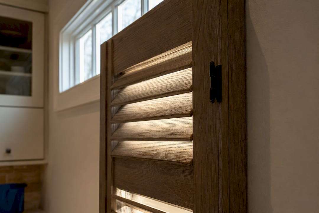 Wood shutters louver detail on transom window