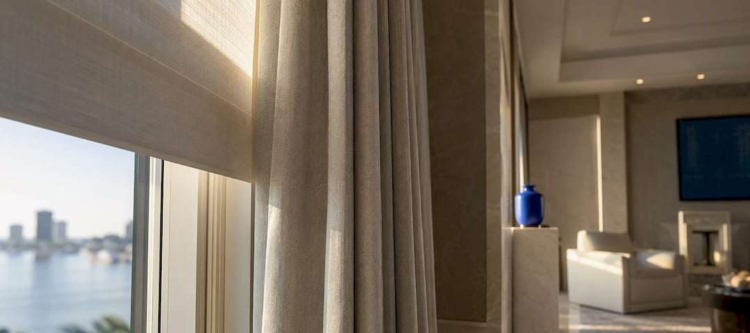 1788131473044_Tailored-window-treatment-in-a-luxury-transitional-interior | Drapery Company Tailored window treatment in a luxury transitional interior