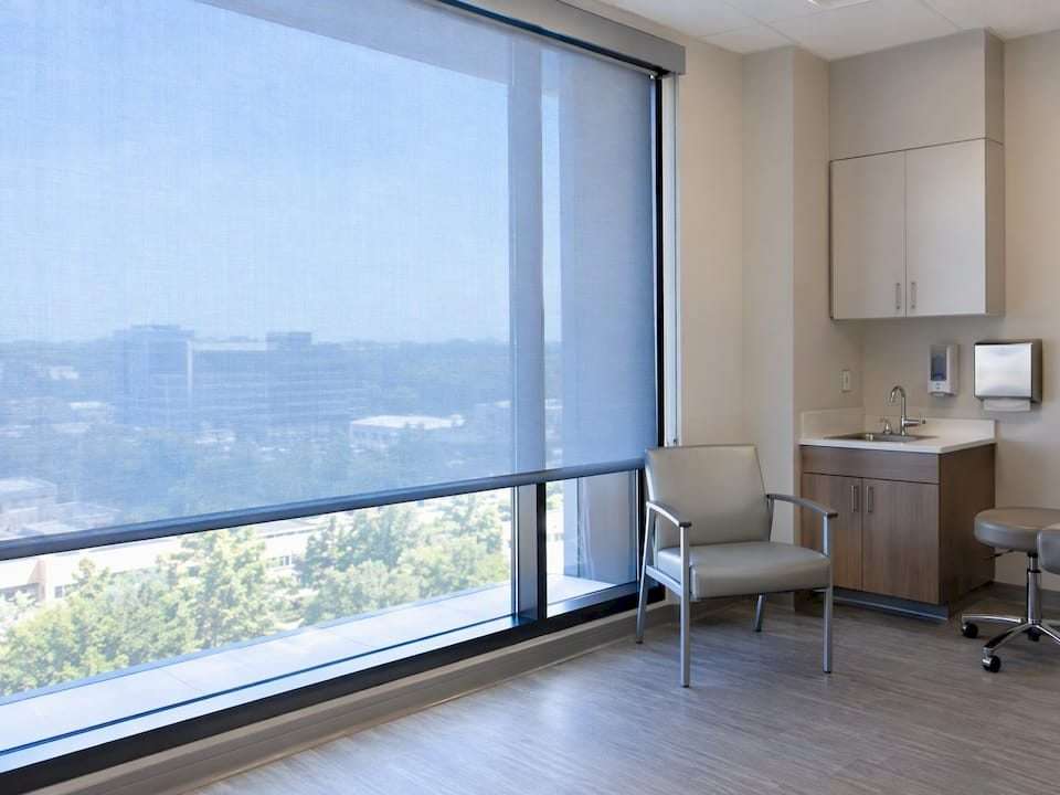 Dual-layer shade in a healthcare consultation room