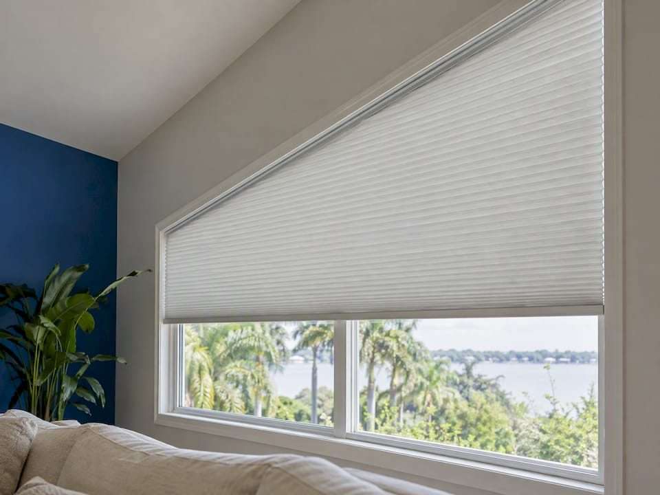 Custom cellular shade fitted to trapezoid window