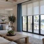 Layered window treatments in a Tampa living room