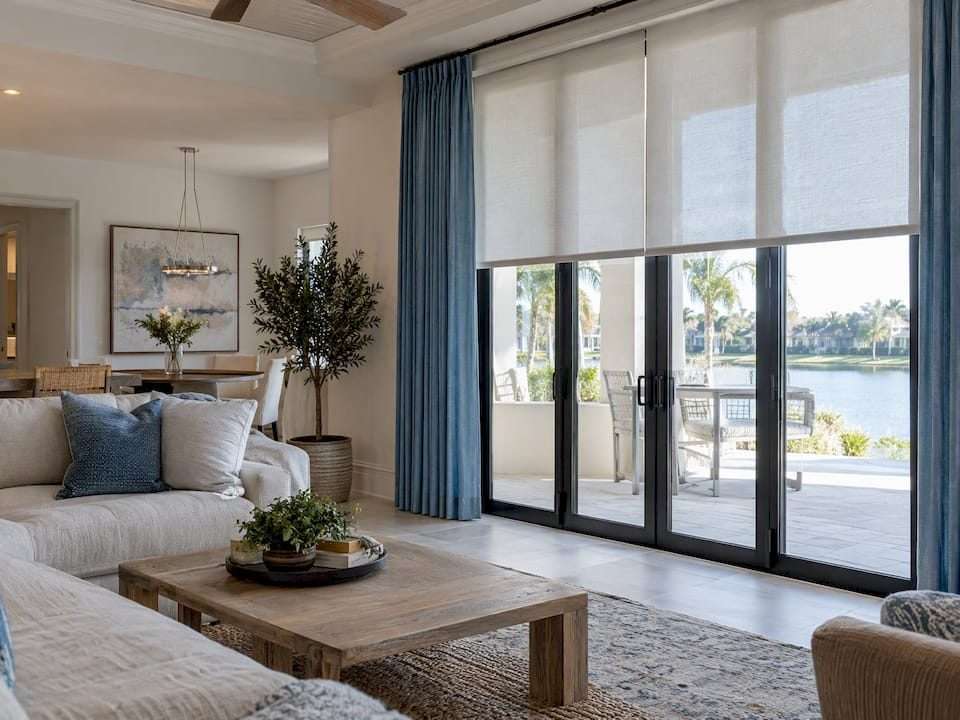 Layered window treatments in a Tampa living room