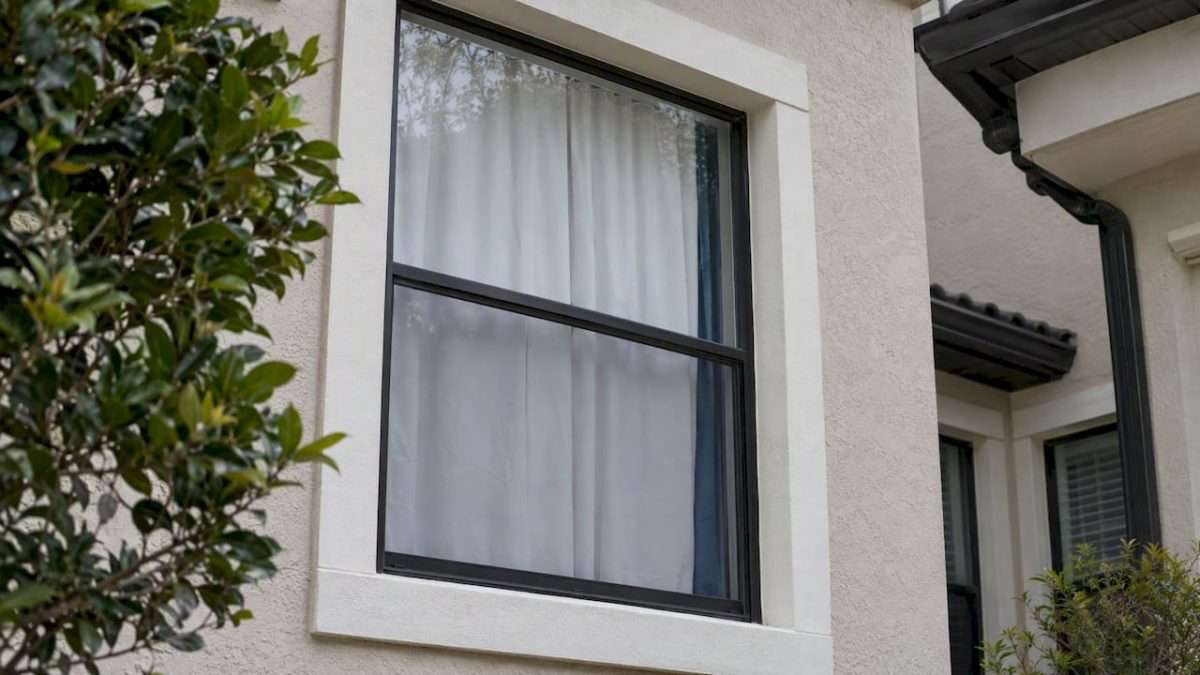 1792463762738_White-backed-curtains-seen-from-a-townhouse-exterior | Drapery Company White-backed curtains seen from a townhouse exterior