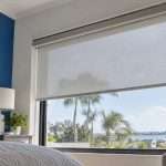 Motorized roller shade in Tampa bedroom